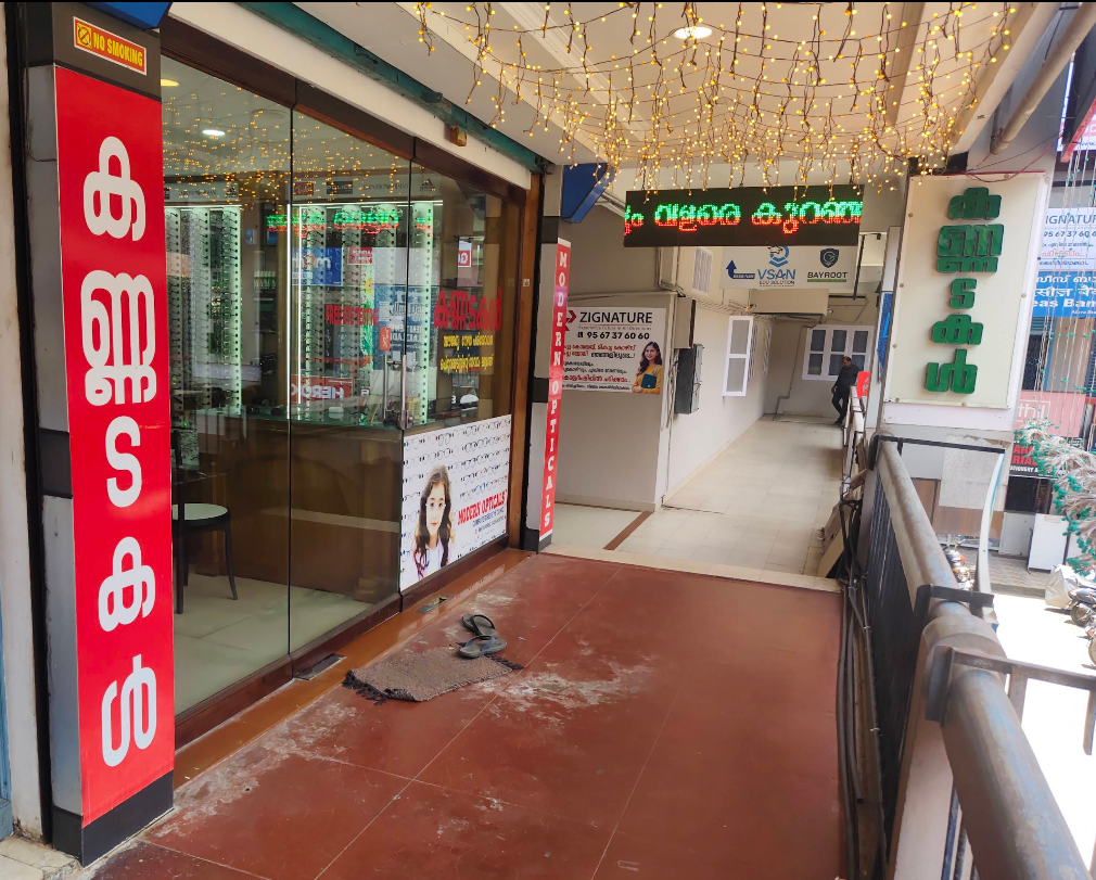 MODERN OPTICALS,ALUVA